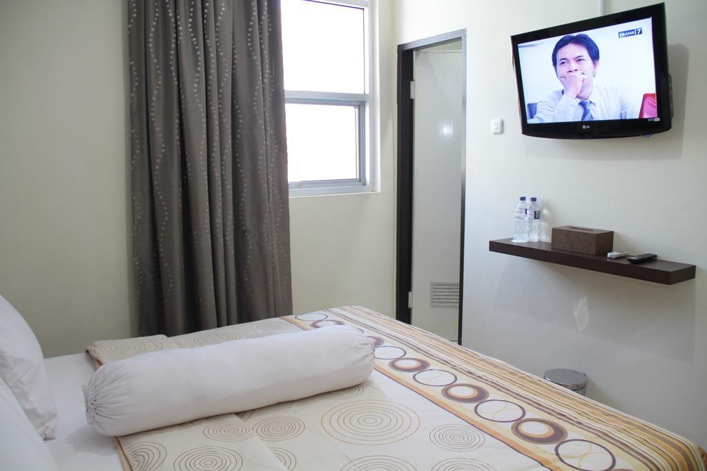 Vindhika Hotel Makassar Kamer foto